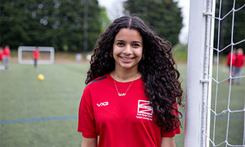 Sport learner on football pitch