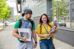 HE students walking through campus