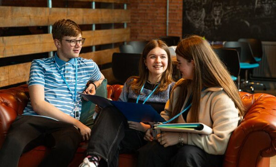 Students sitting on a sofa