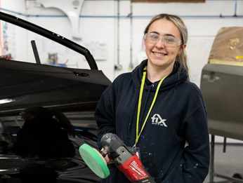 Student in car body workshop